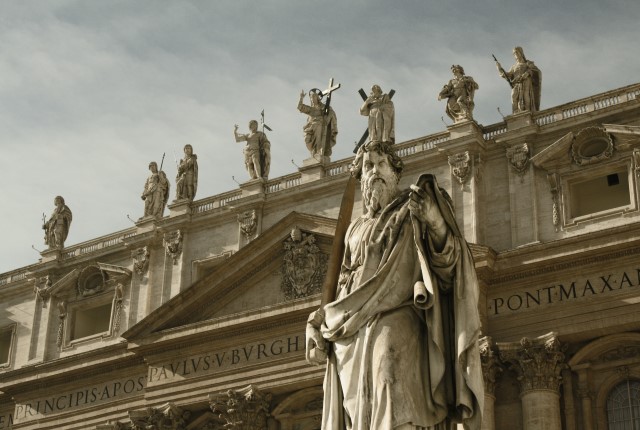 Statues close to heaven on top of St. Peter's Basilica's façade at Vatican City